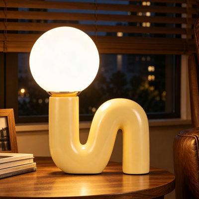 Light Yellow S-Curve Ceramic Table Lamp with Frosted Glass Globe Shade, 15 Inch Tall