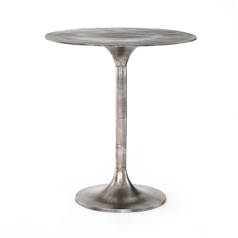 Modern silver metal pedestal side table with a circular top and tapered base against a white background.