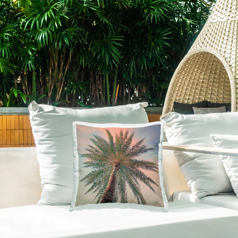 Palm Up Against Sunset Outdoor Printed Pillow design by Susan Jill, Pink Palm