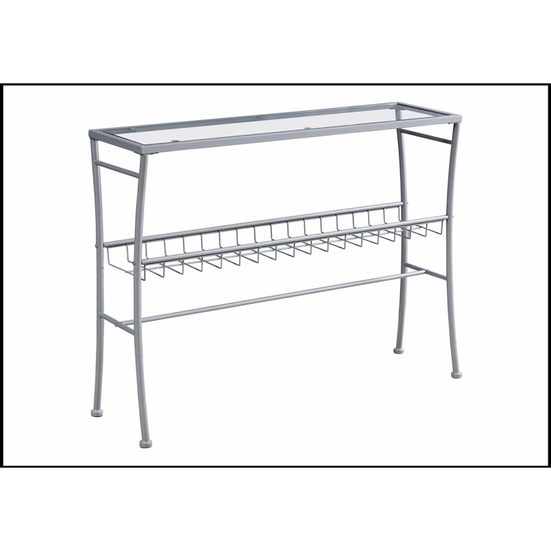 Élégante console étroite avec plateau en verre trempé transparent et structure en métal argenté pour les entrées et les salons modernes