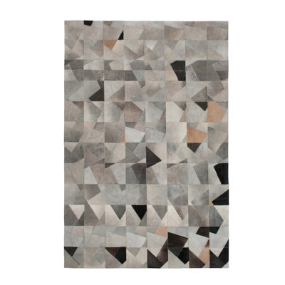 Faceta Cowhide Abstract Area Rug
