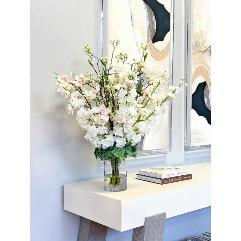 Delphinium and Butterfly Magnolia Arrangement