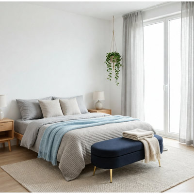 Repose-pieds ovale en flanelle avec pieds en métal pour rangement supplémentaire et rangement caché dans les maisons modernes