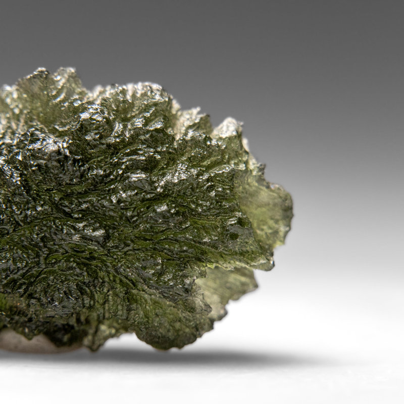 Genuine Moldavite Tektite (18.8 grams), 0.5" H x 1" W x 1.75" D