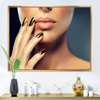 " Female Model With Golden Make-Up And Black Nails "
