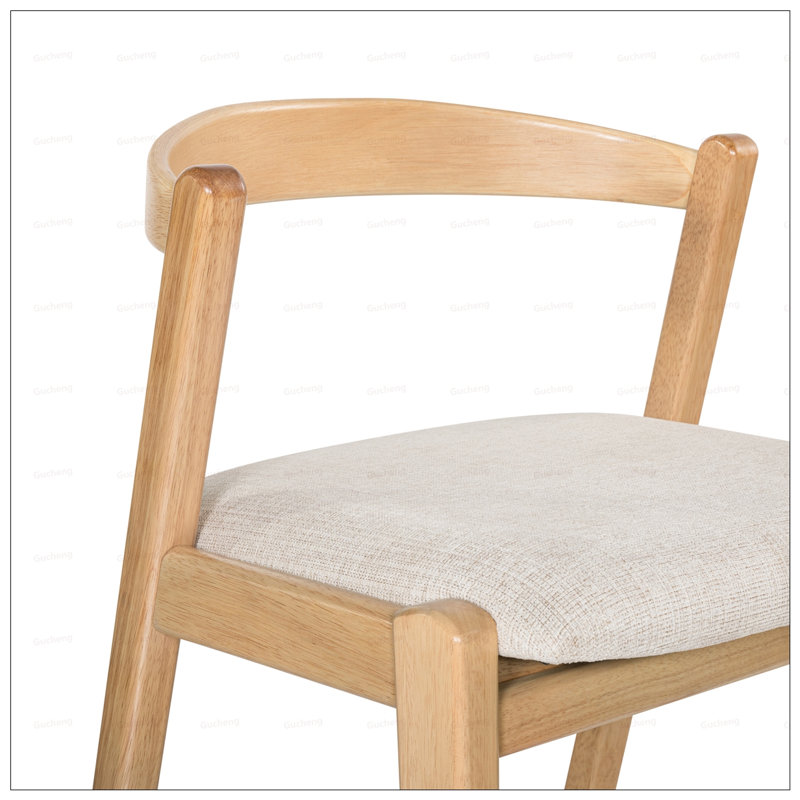 Tabouret de bar d'intérieur en bois d'hévéa Balmans avec finition naturelle et revêtement confortable, parfait pour les cuisines modernes et traditionnelles