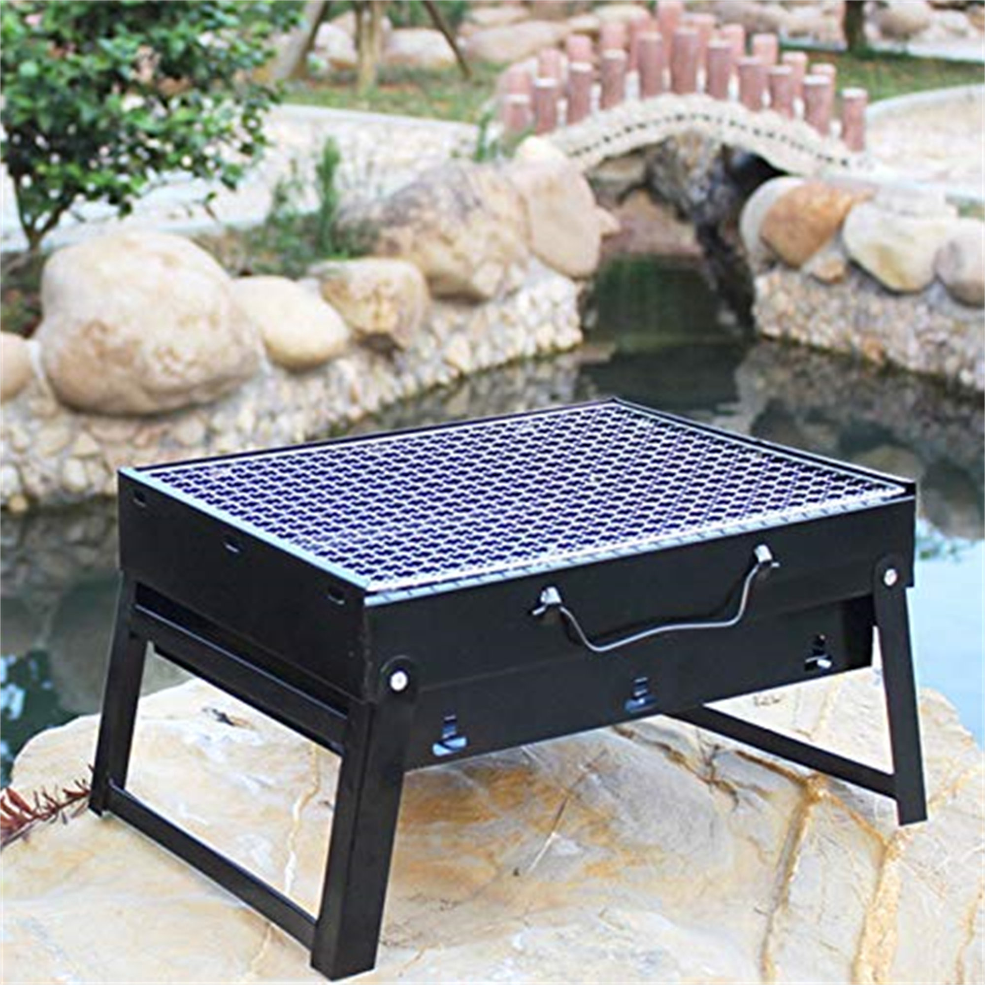 https://assets.wfcdn.com/im/65017012/compr-r85/2492/249207028/plastic-development-138-w-portable-charcoal-grill.jpg