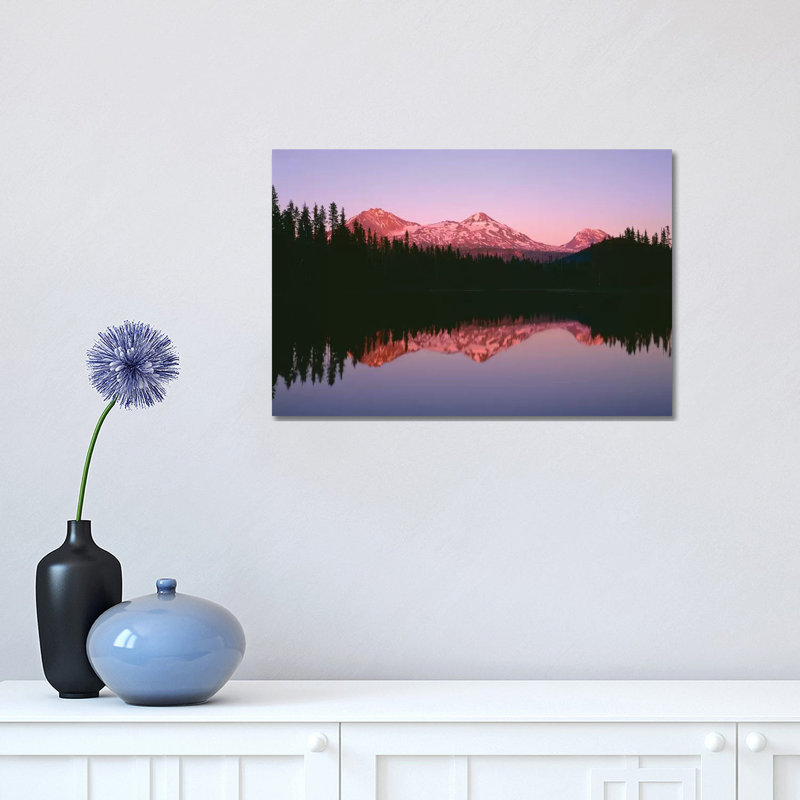 Or, Willamette Nf. Sunset Reddens The Three Sisters Which Reflect In Scott Lake. by John Barger - Wrapped Canvas Print