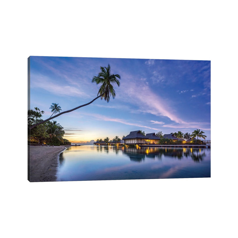 Sunset At A Luxury Beach Resort On Moorea, French Polynesia by Jan Becke - Wrapped Canvas Print