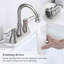 Meuble-lavabo en nickel brossé avec bec pivotant, bonde escamotable et conception à deux poignées, fabrication en métal