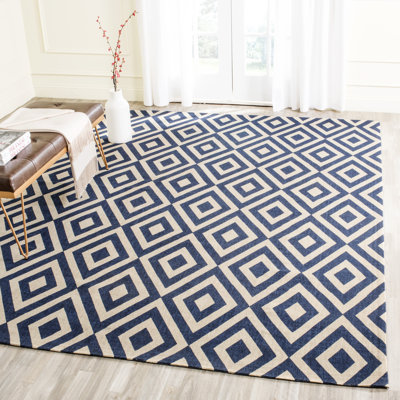 Tapis ivoire / bleu marine en jute / sisal tissé à la main Nilde