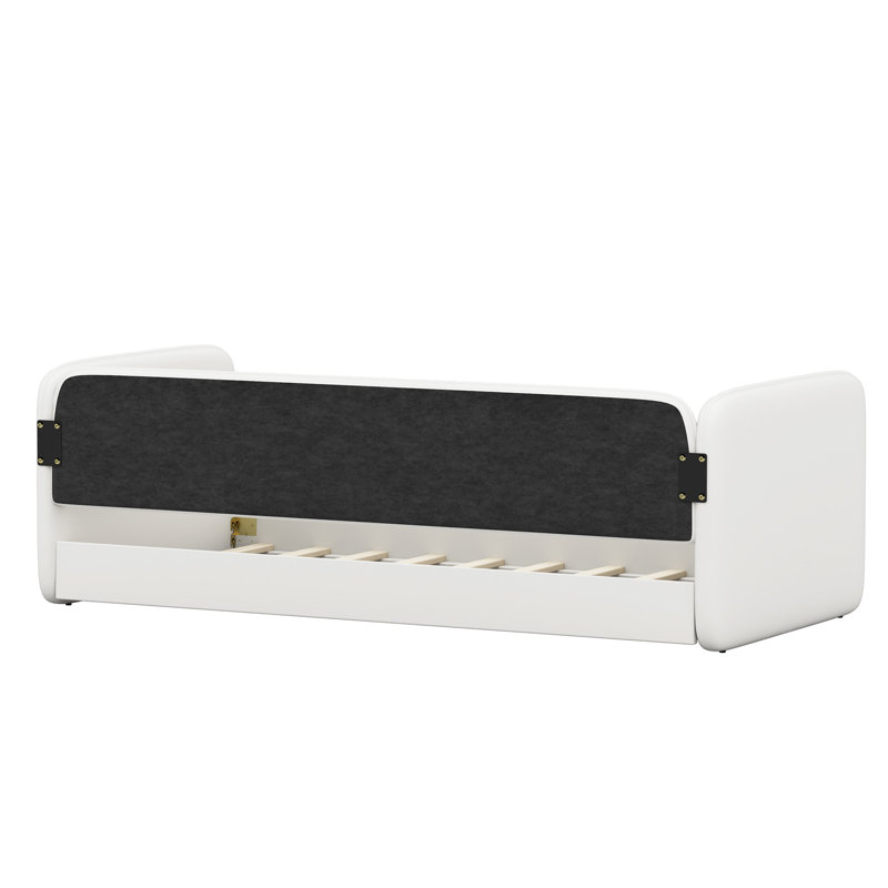 Lit simple au sol avec tête de lit et accoudoirs rembourrés, structure de lit en velours au design doux et sécuritaire, lit plateforme à profil bas avec côtés de protection, beige