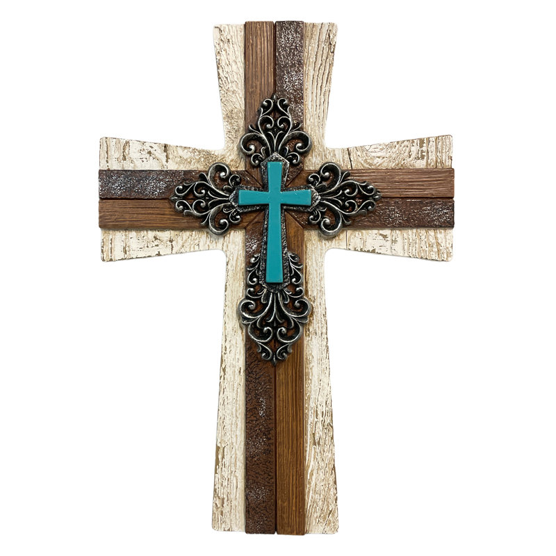 Croix murale en polyrésine et faux bois avec volutes turquoise