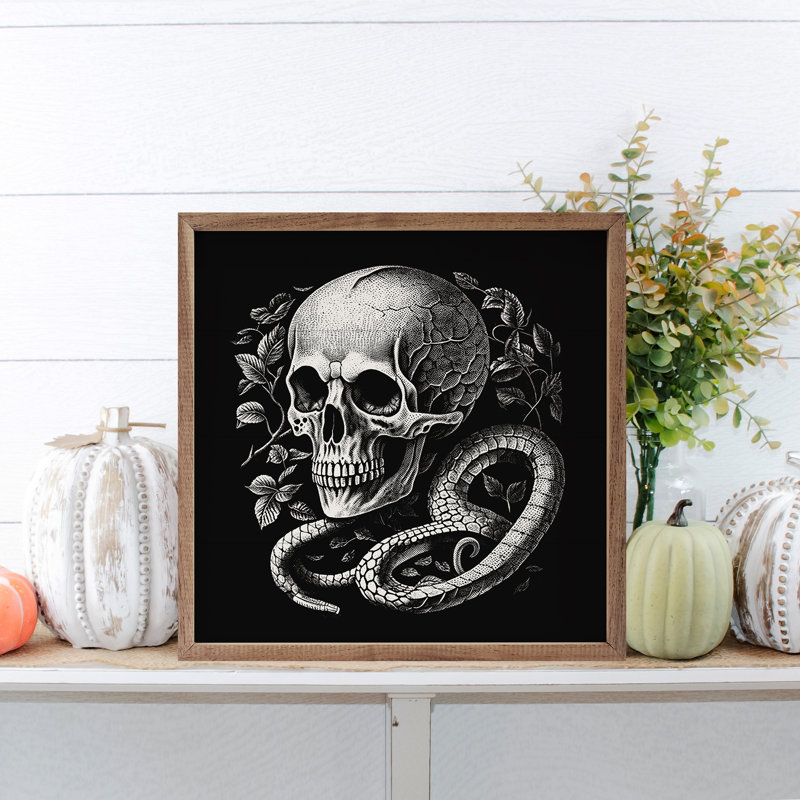 Crâne et serpent noir, L 16 po x H 16 po