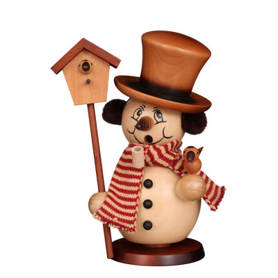 Bonhomme de neige fumoir avec oiseau