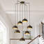 Lustre moderne à 7 lumières de 66 cm (26 po) en noir et laiton avec suspensions en forme de dôme réglables