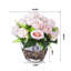 Arrangement floral rose dans un vase en verre