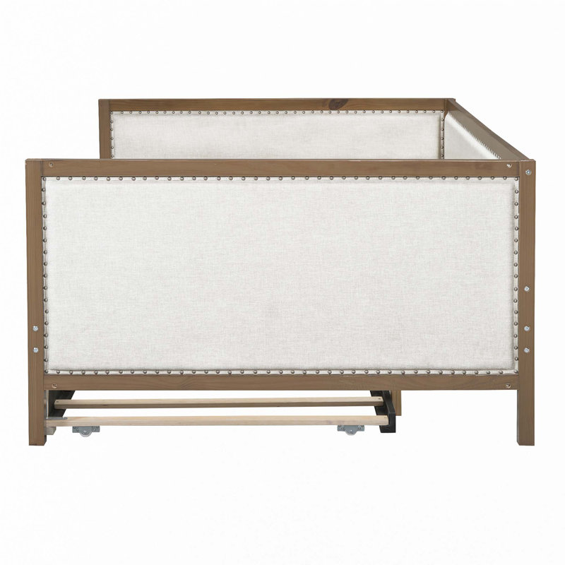 Lit de jour rembourré avec couchette et décoration cloutée
