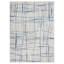 Tapis ivoire et bleu à motifs irréguliers-953844991