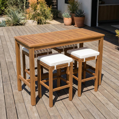 Ensemble de bar d'extérieur 5 pièces: une table de patio en bois de sauterelle et quatre tabourets avec coussins, parfaits pour la cour, le bord de la piscine ou le balcon