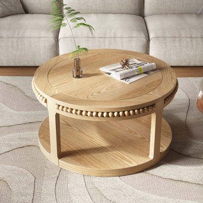 Table basse ronde en bois massif, plateau épaissi à 2 niveaux et pieds robustes