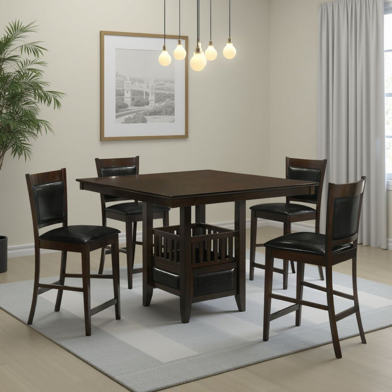 Ensemble de salle à manger 5 pièces à hauteur de comptoir Edan, table brune, chaises rembourrées noires