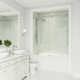 Elan E-Class 56-60" W x 66" H Sliding Frameless Tub Door with 3/8" Clear Glass