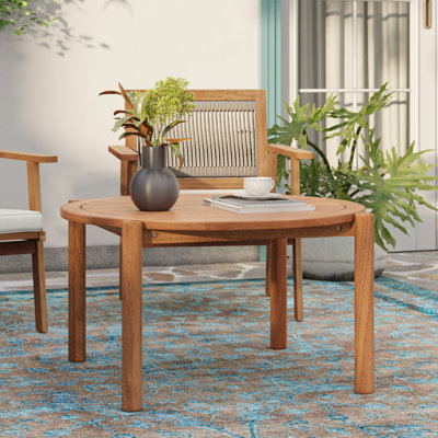 Natural Solid Wood Round Outdoor Coffee Table by Loon Peak