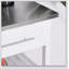 Îlot de cuisine avec plateau en acier inoxydable, tablettes ouvertes, tiroirs, gris