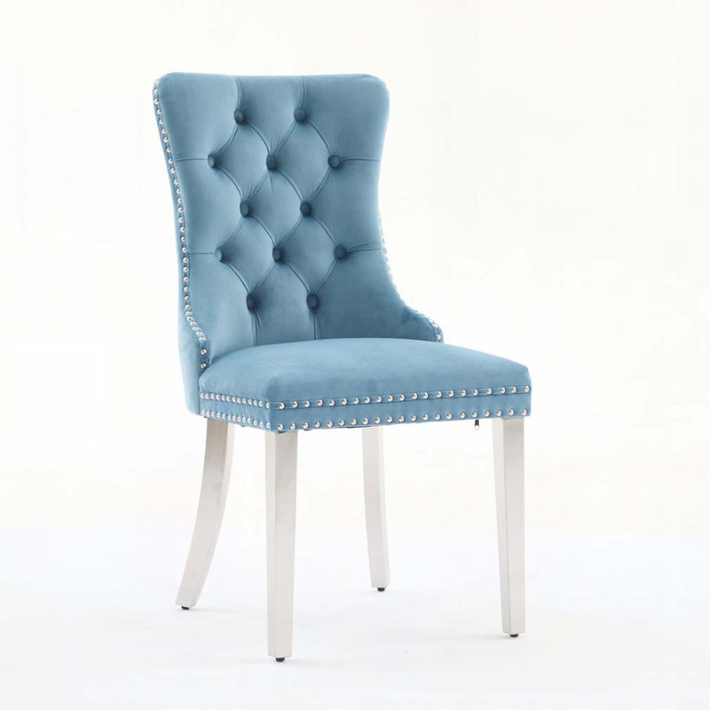 Chaise de salle à manger rembourrée en velours avec pieds en acier inoxydable chromé