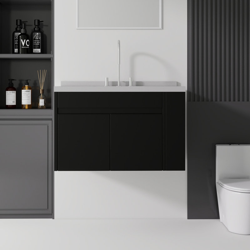 Meuble-lavabo suspendu de 91 cm (36 po) en contreplaqué avec lavabo en céramique (trou de trop-plein), comptoir et dosseret en marbre reconstitué, portes à fermeture amortie, tablette latérale ouverte, noir