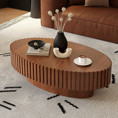 Table basse ovale en forme de piédestal robuste fabriquée à la main
