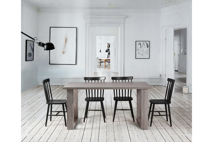 all white dining room with table and chairs and scroll molding