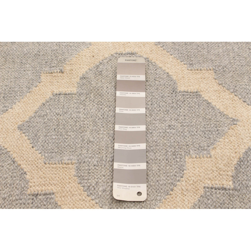 Tapis géométrique ivoire / gris clair en laine tissé à plat à la main Abraxas