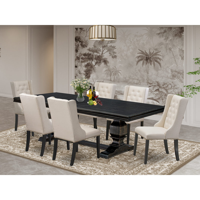 L'ensemble de salle à manger 7 pièces se compose d'une table à manger et de 6 chaises de cuisine en tissu de lin crème et de pieds noirs avec dossier capitonné - finition noir sablé.