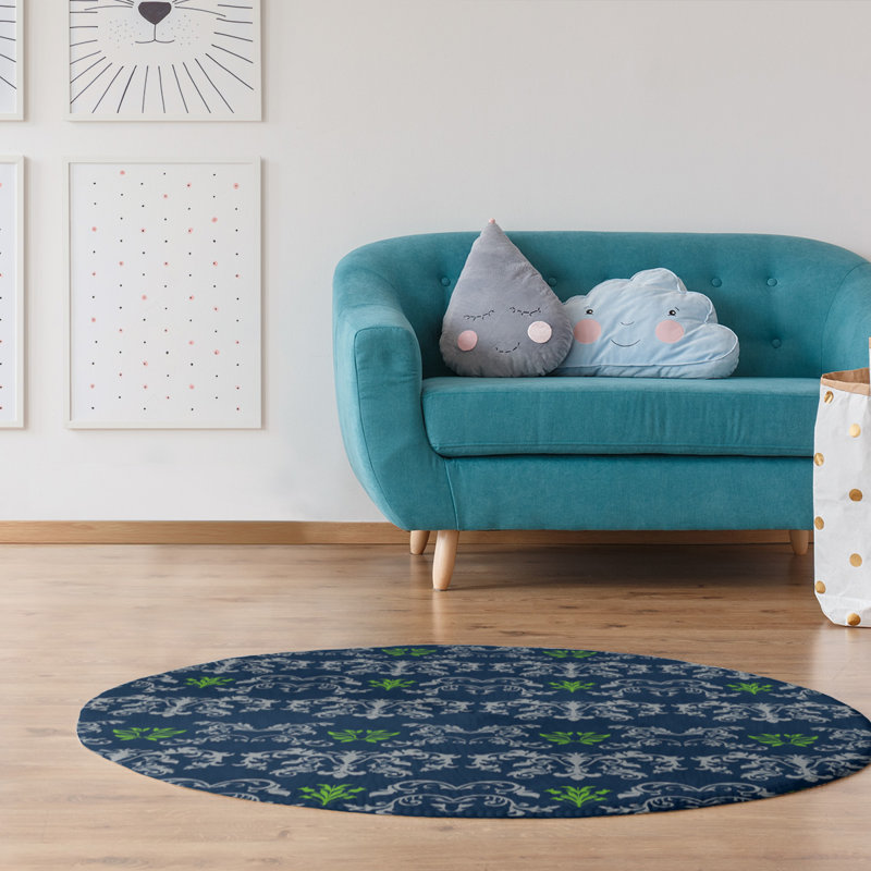 Tapis rond bleu damassé à motif baroque