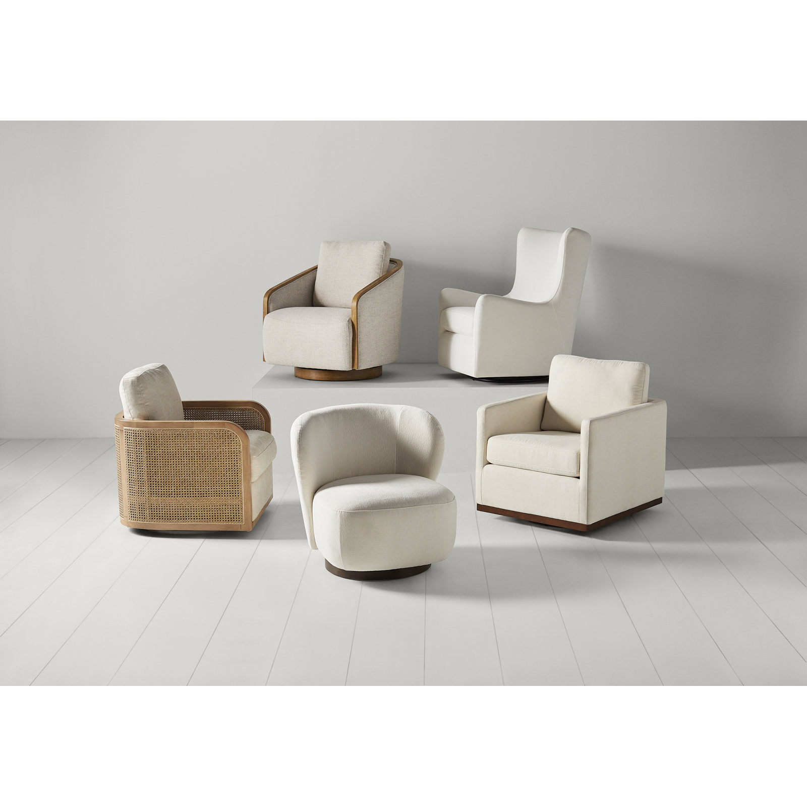 Juliette Upholstered Natural Cane Swivel Barrel Chair