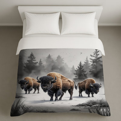 Bison dans un paysage d'hiver Housses de couette