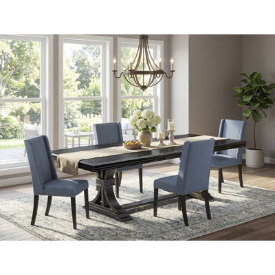 Cet ensemble de salle à manger de cuisine 5 pièces se compose d'une table et de 4 chaises en tissu de lin bleu minéral avec dossier rembourré - finition noire sablée.