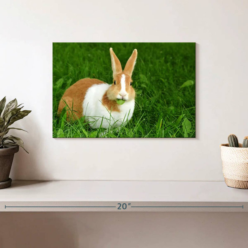 Lapin mangeant une feuille, H 8 po x l 12 po