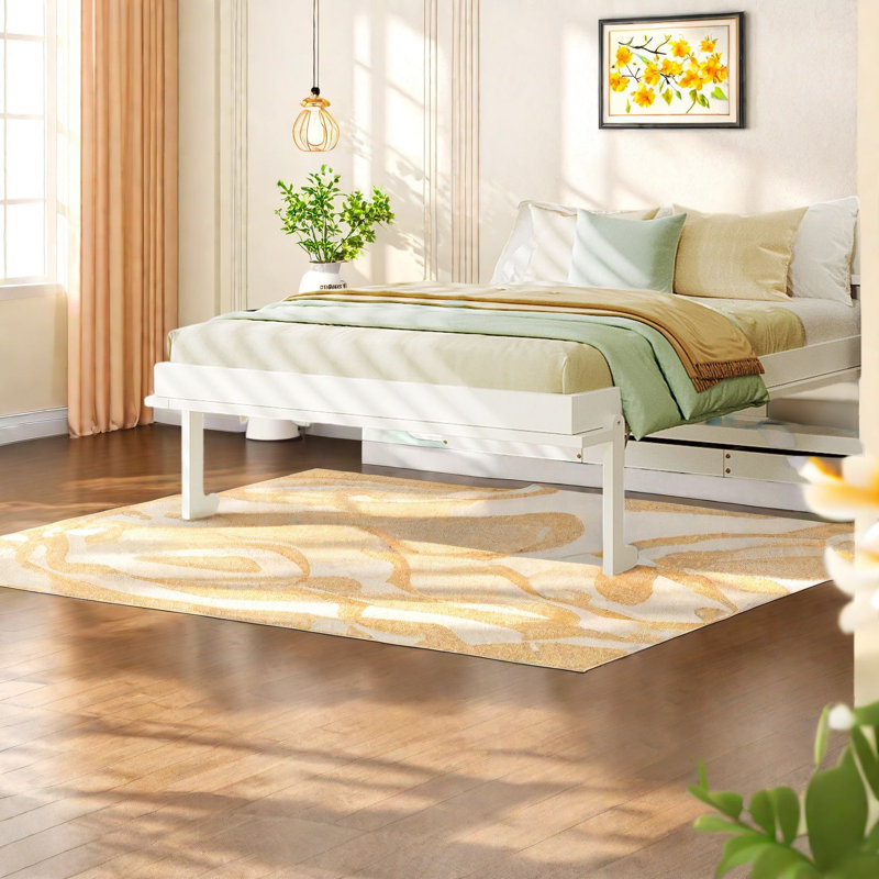 Lit escamotable en bois peu encombrant avec solutions de rangement modernes pour une vie compacte