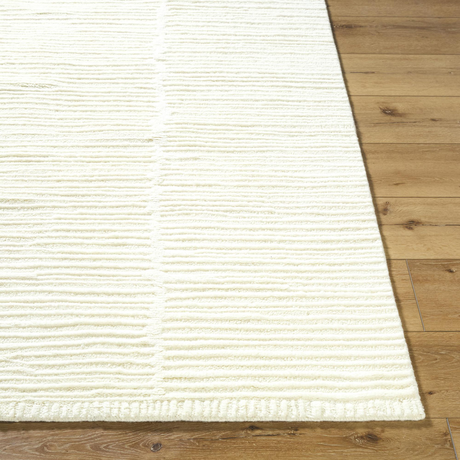 Elayne Handmade Wool Ivory Rug, Rectangle 6'6" x 9'8"