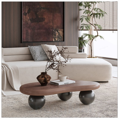 Table basse en forme de nuage avec 3 pieds sphériques, courbes et plateau spacieux pour les salons modernes