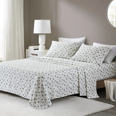 Drap en flanelle de coton 4 pièces pour lit très grand, motif de flocons de neige noirs, luxe pour matelas jusqu'à 18 po, douceur supérieure du brossage, ajustement élastique, pré-rétréci, livré avec des taies d'oreiller plates et 2,