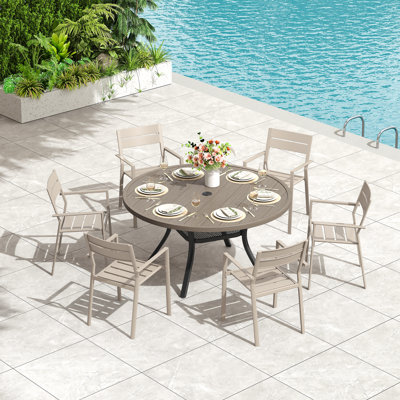 Round Patio Dining Set with 48" Round Metal Dining Table and 6 Metal Armrest Dining Chairs by Red Barrel Studio