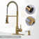 Single Handle Pull Down Kitchen Faucet with Soap Dispenser in Brushed Nickel