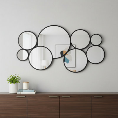 Ensemble de huit miroirs d'appoint ronds en métal noir