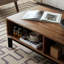 Table basse rectangulaire 47,24 "brun + noir massif + bois manufacturé + fer