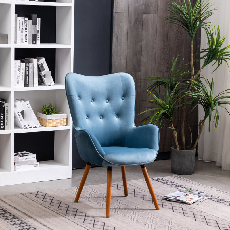 Chaise à dossier bleu en velours avec pieds en bois massif et capitonnage en velours soyeux, Bleu
