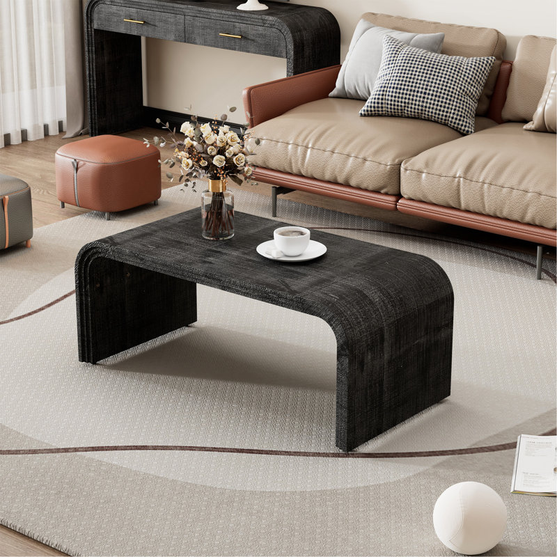 Table basse minimaliste avec un design Art déco incurvé - convient au salon et à la salle à manger, Noir